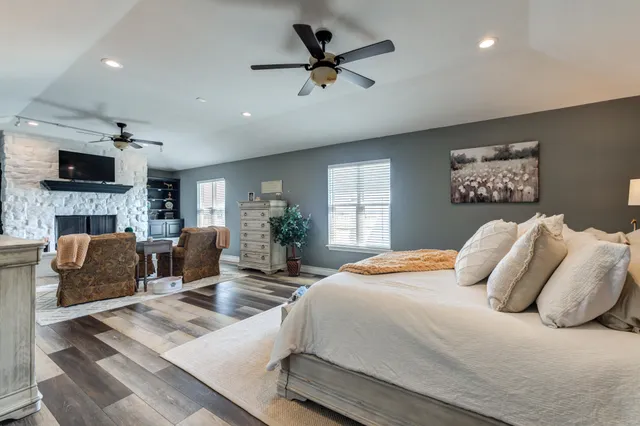 a bathroom with a sink double vanity and a mirror