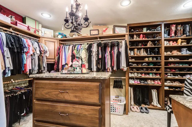 a view of a field with tree in the background