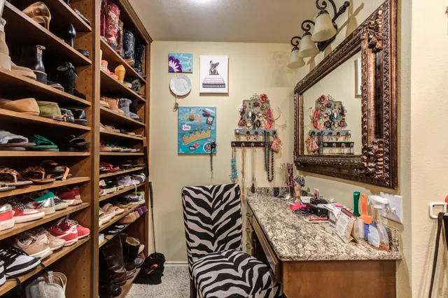 a view of a field with a tree