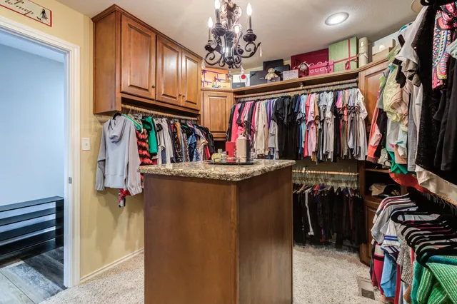 a view of parking garage with cars