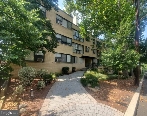 a view of a house with a garden