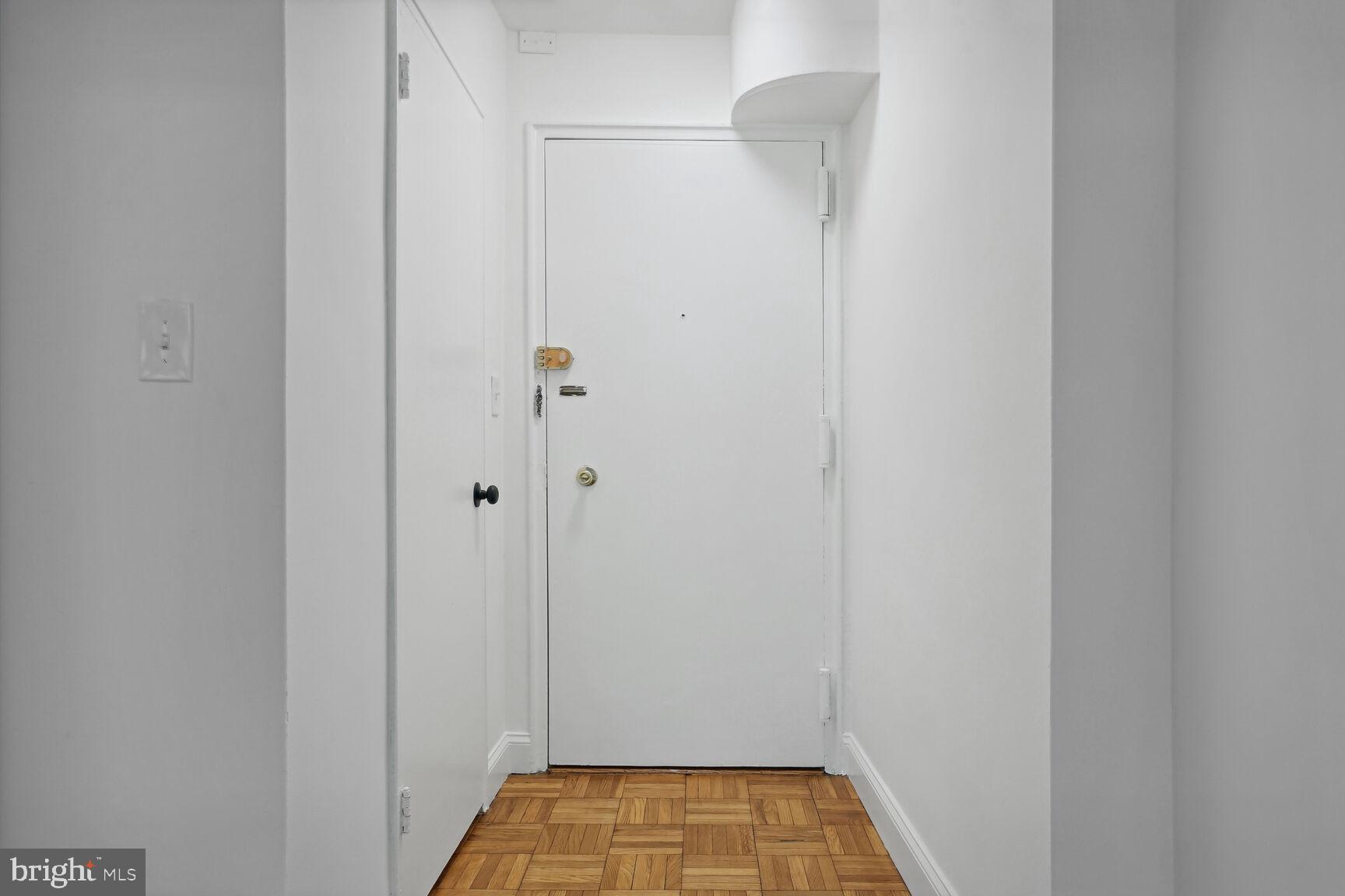3901 Tunlaw Road Northwest, Unit 502 Washington, DC 20007 - Photo 20 of 34 a bathroom with a shower
