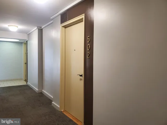 a view of hallway with closet