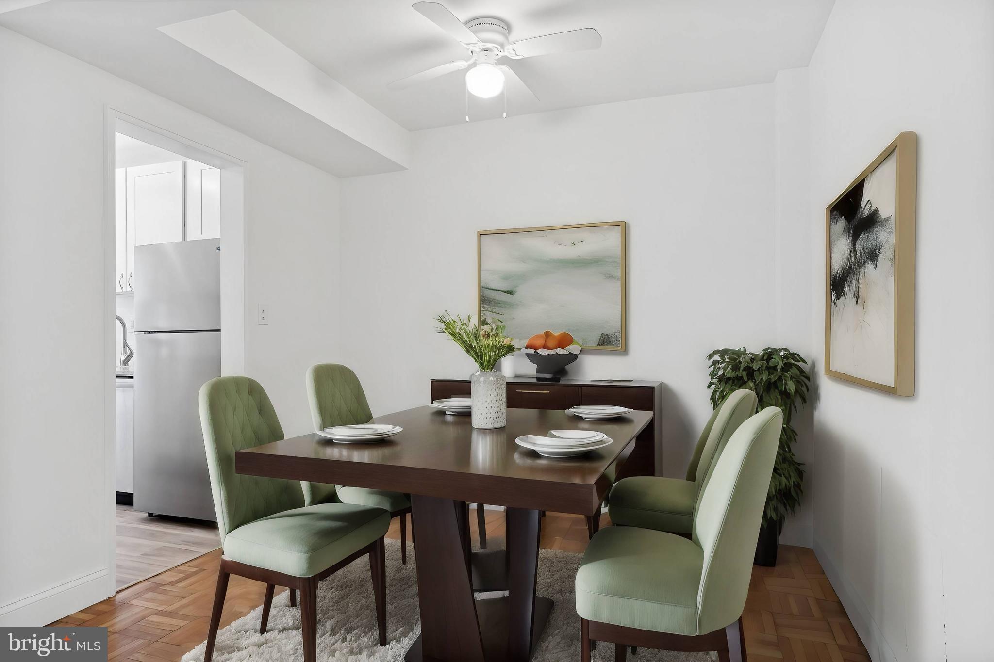 3901 Tunlaw Road Northwest, Unit 502 Washington, DC 20007 - Photo 8 of 34 a dining room with furniture and window