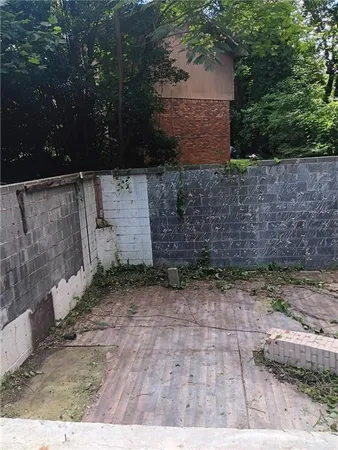 a view of a backyard of a house