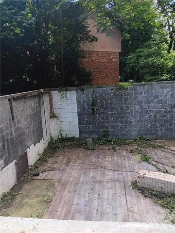 a view of a backyard of a house