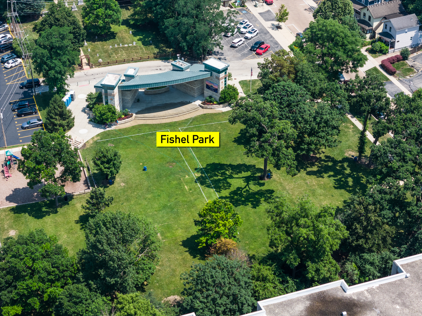 1110 Grove Street, Unit 4H Downers Grove, IL 60515 - Photo 28 of 30 a sign that is sitting on a street