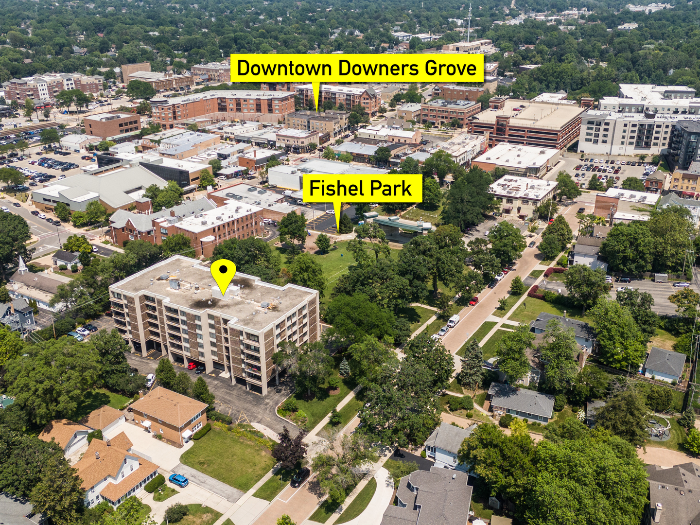 1110 Grove Street, Unit 4H Downers Grove, IL 60515 - Photo 29 of 30 an outdoor space with seating area and trees in the background