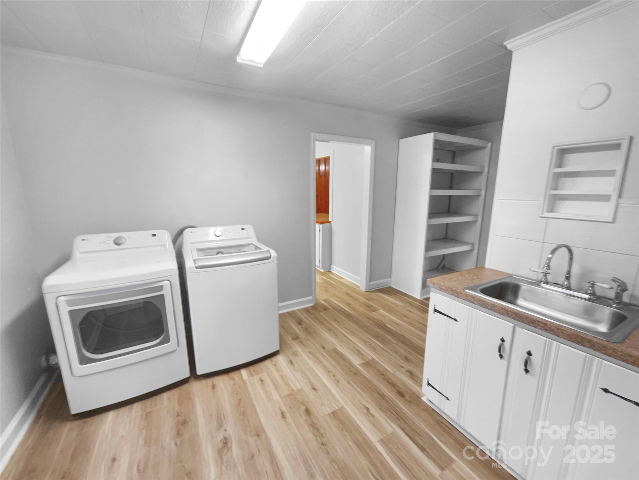 2009 Hickory Grove Road Gastonia, NC 28056 - Photo 13 of 20 a utility room with sink dryer and washer