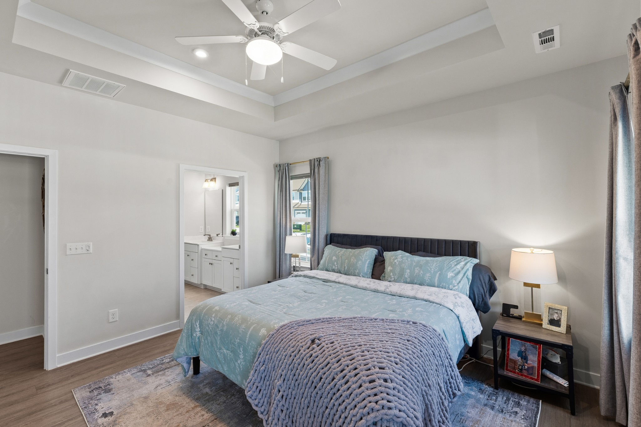 203 Pitchfork Way Gallatin, TN 37066 - Photo 24 of 39 a bedroom with a bed and wooden floor