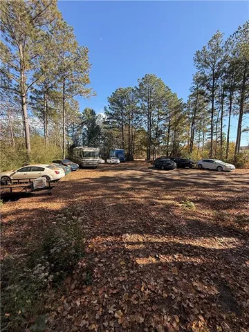 a view of large space with trees