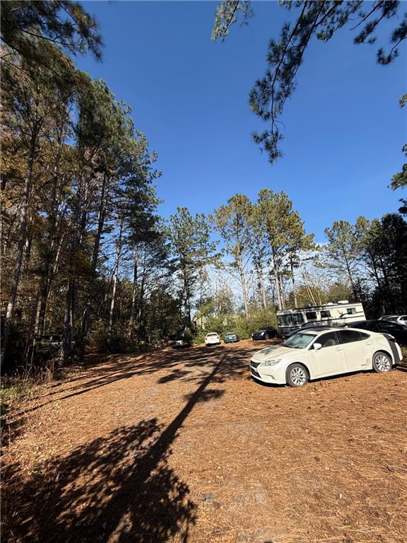 6387 Bells Ferry Road Acworth, GA 30102 - Photo 18 of 28 a view of a swimming pool with lounge chair