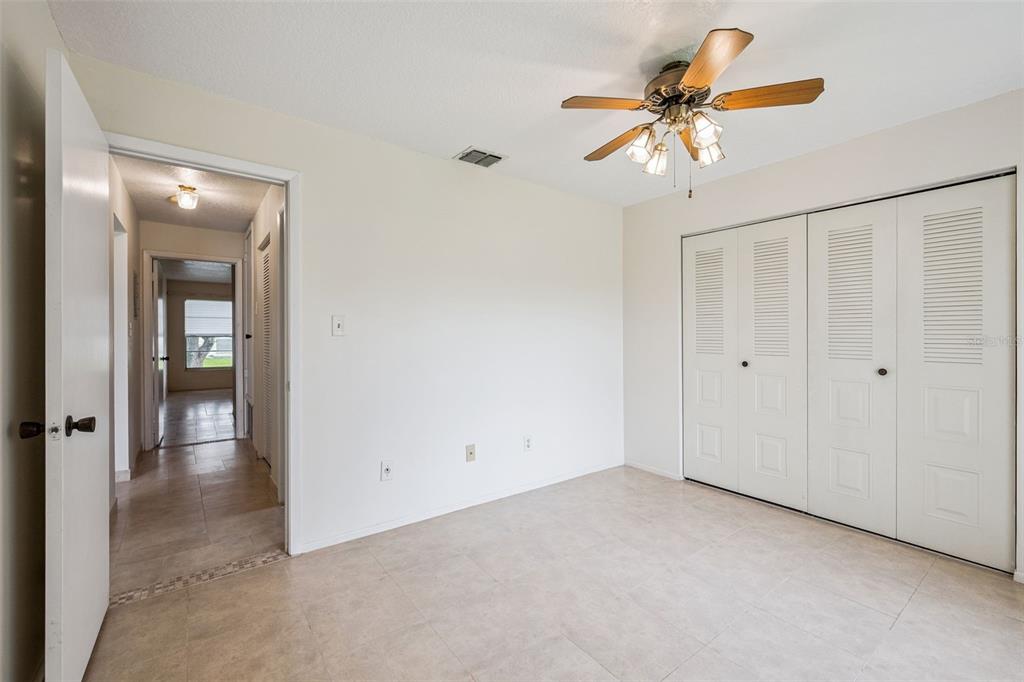 10113 Musket Lane Orlando, FL 32821 - Photo 12 of 23 wooden floor in an empty room