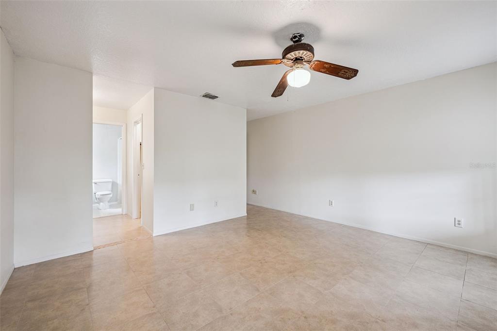 10113 Musket Lane Orlando, FL 32821 - Photo 14 of 23 an empty room