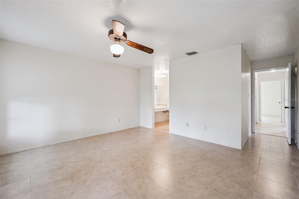 10113 Musket Lane Orlando, FL 32821 - Photo 15 of 23 a view of an empty room