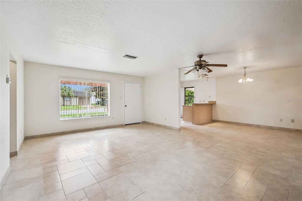 10113 Musket Lane Orlando, FL 32821 - Photo 6 of 23 an empty room with windows