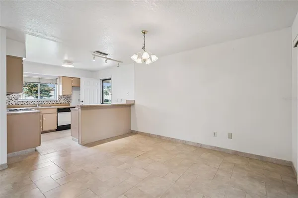 a view of a kitchen with a sink