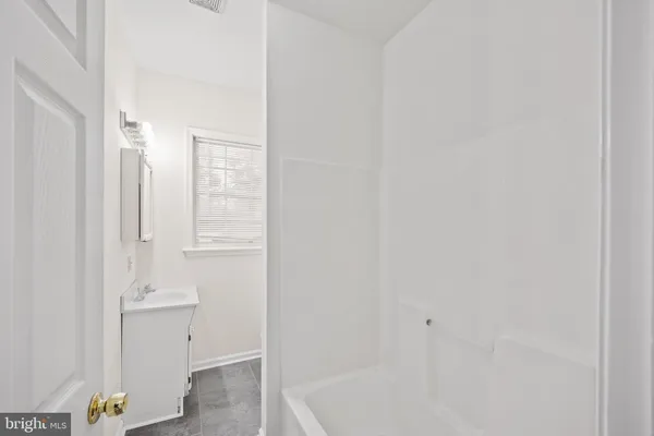 a bathroom with a bathtub