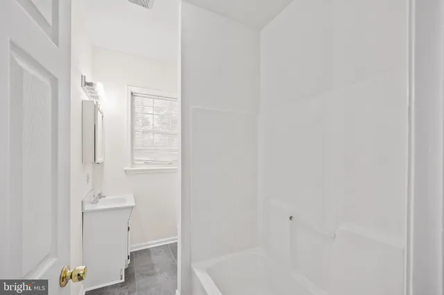 a bathroom with a bathtub