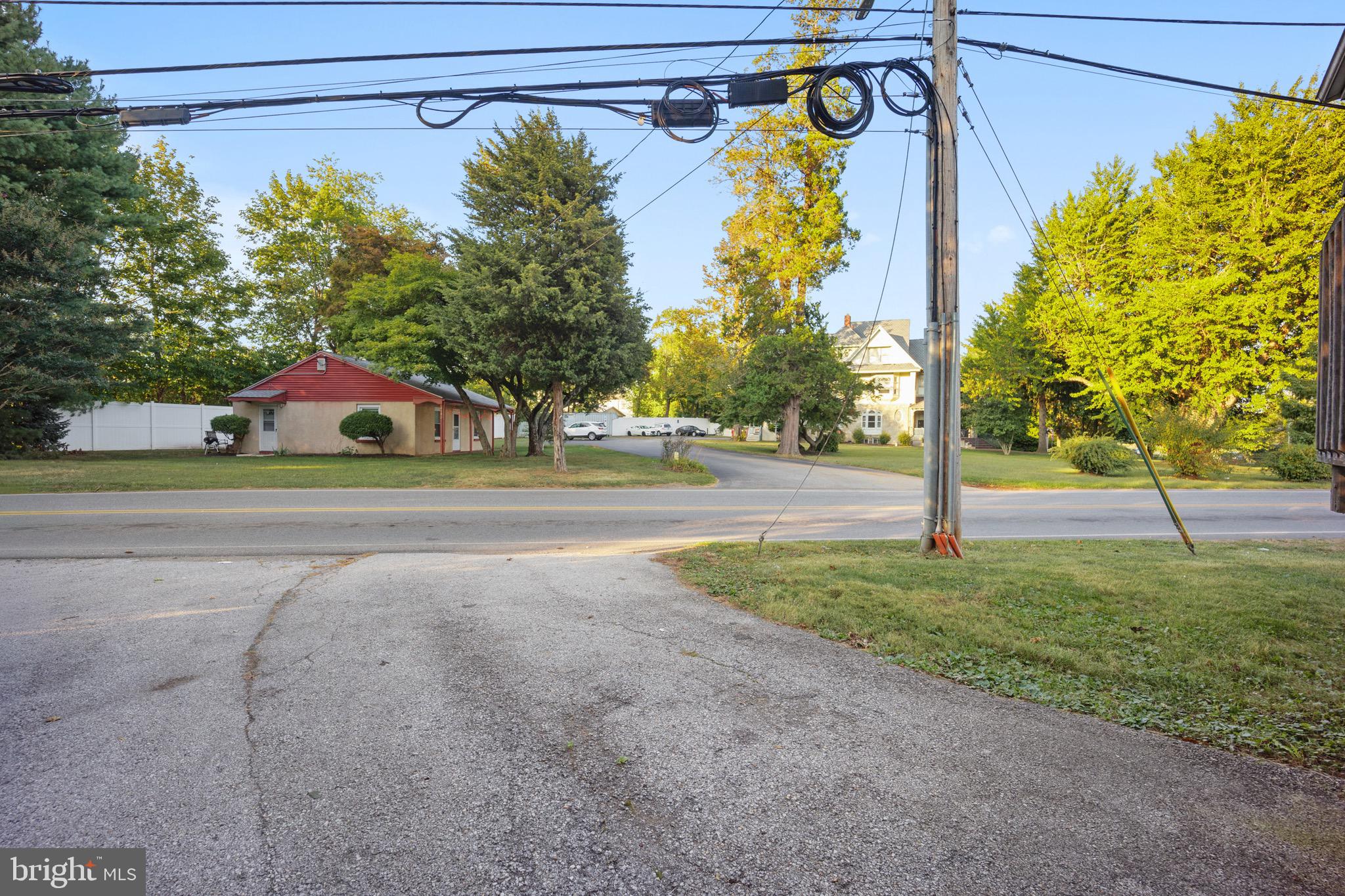 4040 Concord Road Aston, PA 19014 - Photo 22 of 22 a view of a yard with plants and a tree