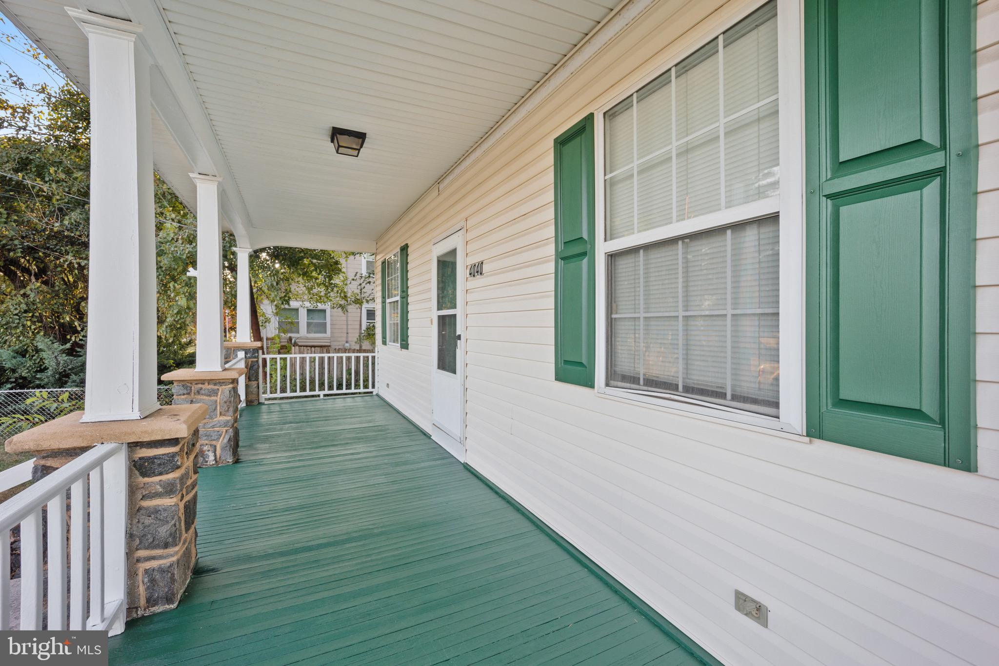 4040 Concord Road Aston, PA 19014 - Photo 3 of 22 a view of a porch with wooden floor and a backyard