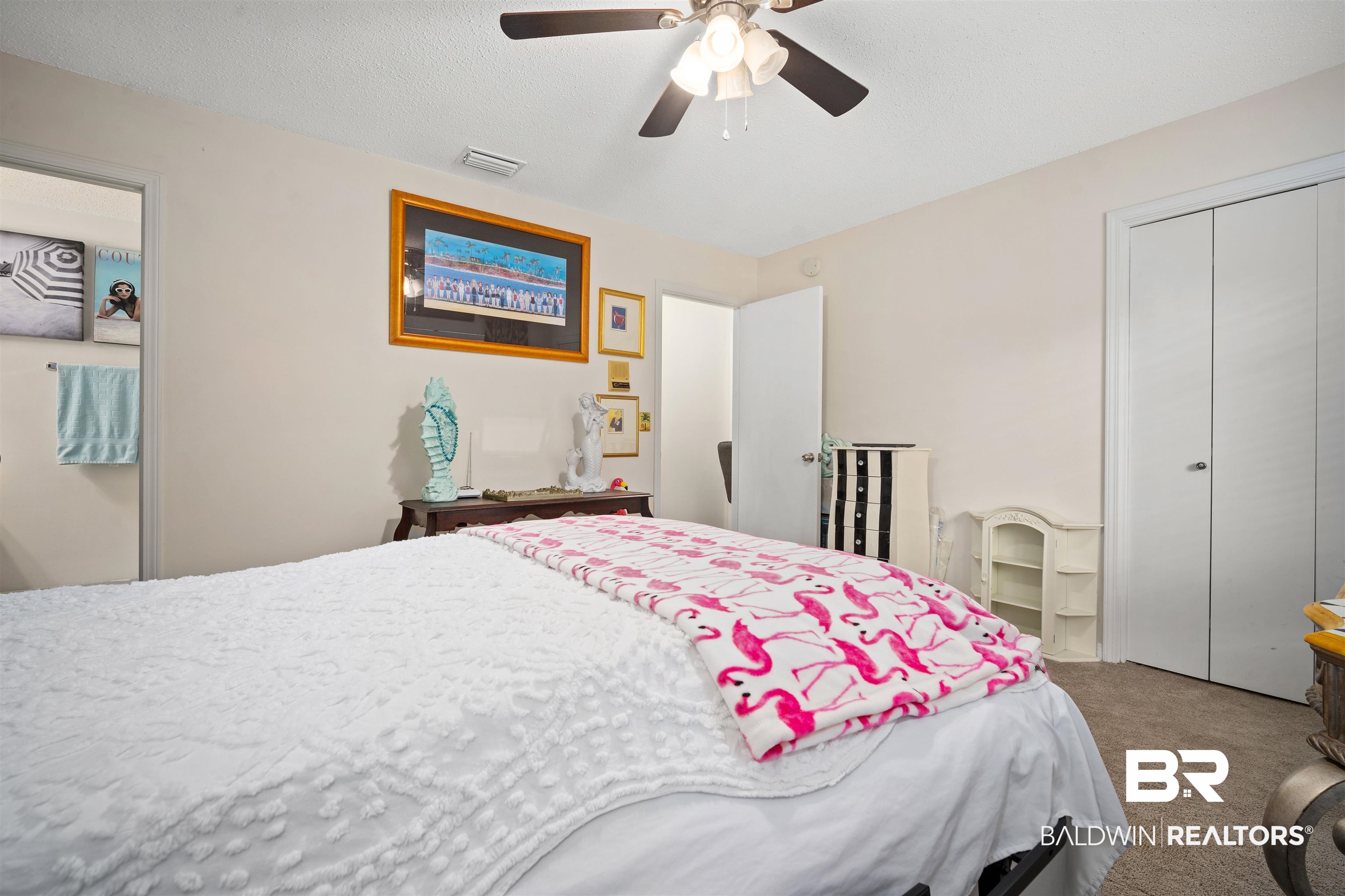 7807 Yorkhaven Road Mobile, AL 36695 - Photo 21 of 34 Carpeted bedroom featuring a closet and ceiling fan