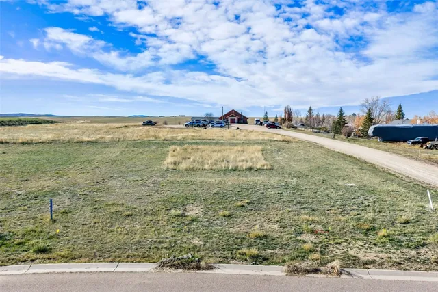 a view of a swimming pool with an ocean view