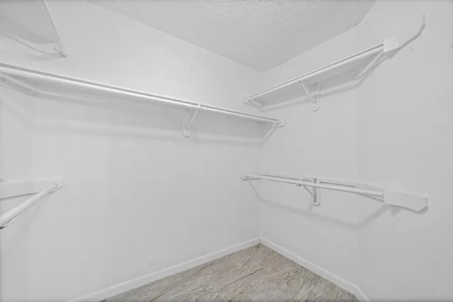 a view of a room with racks on the wall