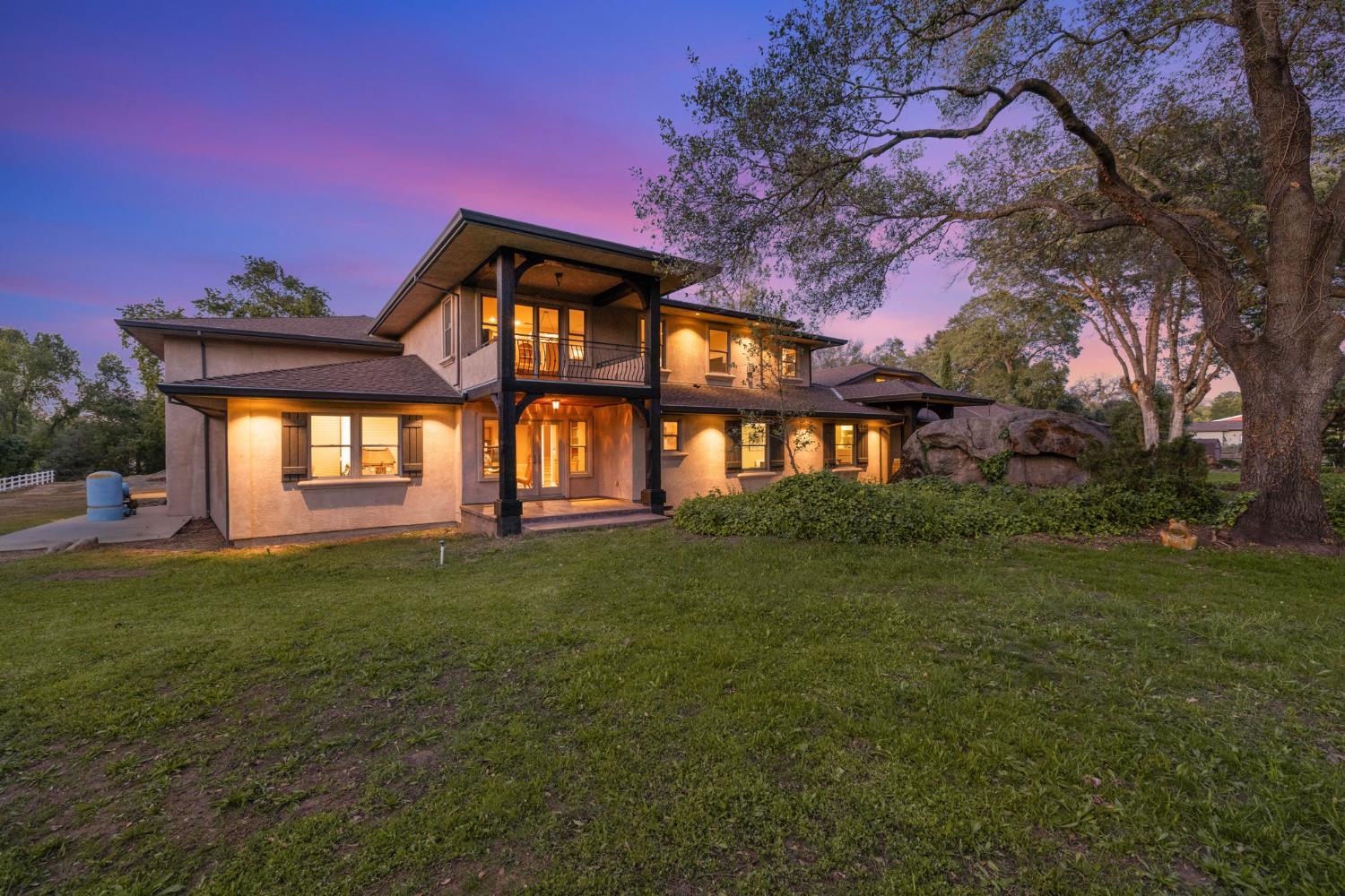 7021 Horseshoe Bar Road Loomis, CA 95650 - Photo 72 of 77 a front view of a house with a garden