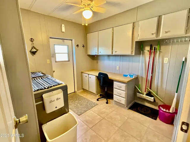 a view of a swimming pool with a yard