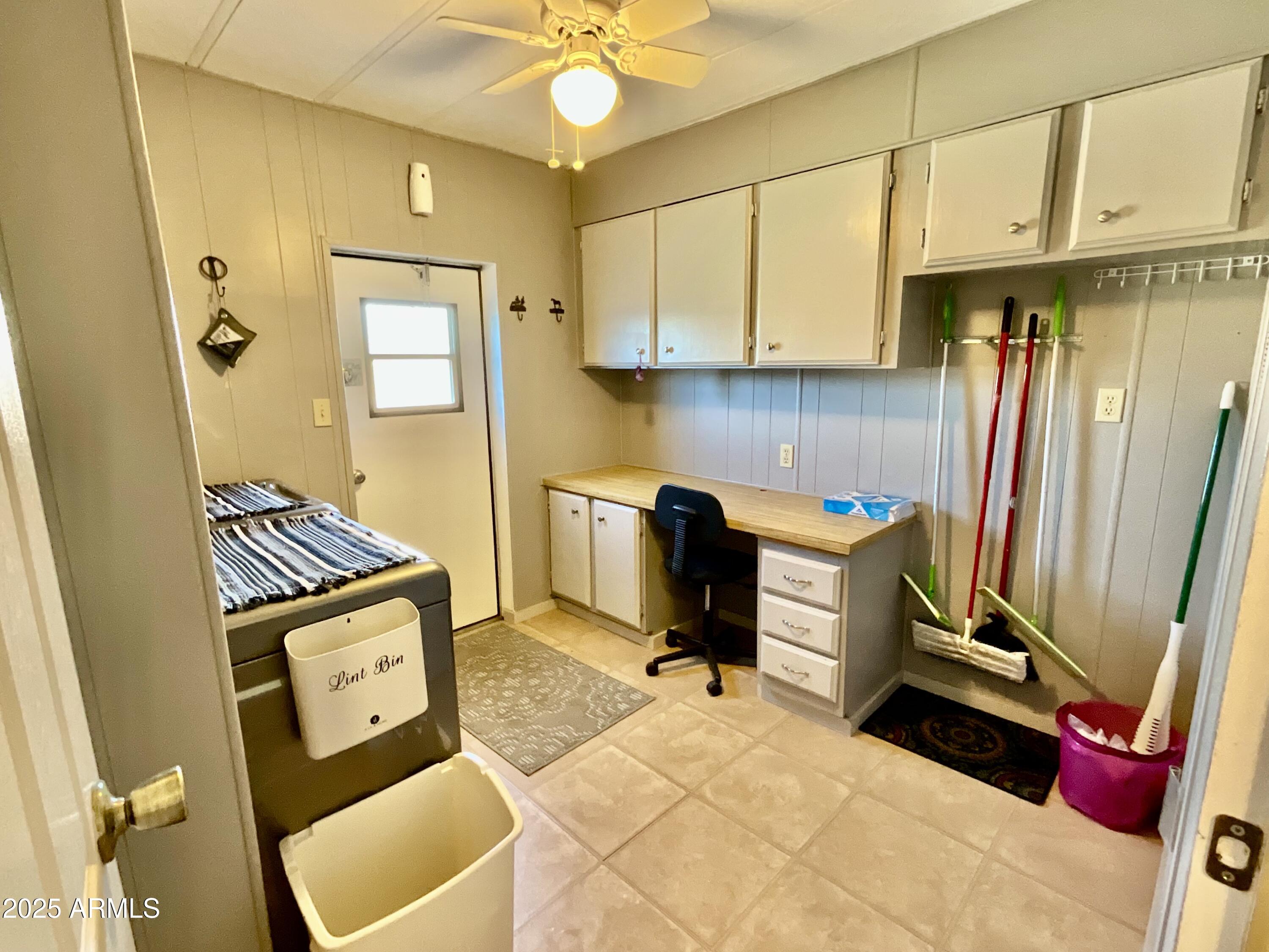 322 West Foothill Street Apache Junction, AZ 85120 - Photo 12 of 33 a bedroom with a bed and gym equipment
