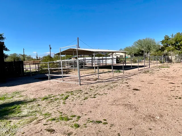 a bedroom with a bed dresser and a window