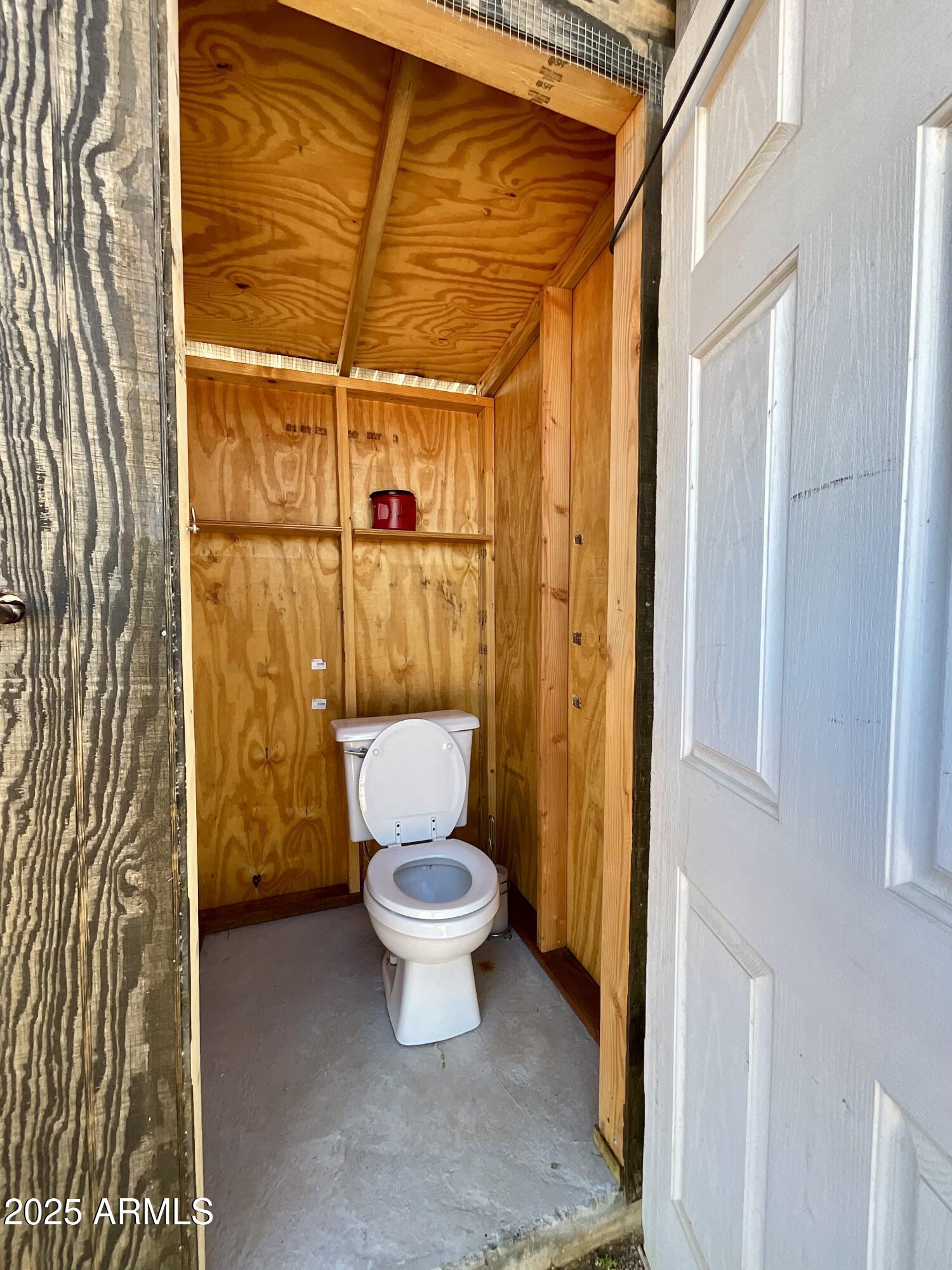 322 West Foothill Street Apache Junction, AZ 85120 - Photo 33 of 33 a bathroom with a toilet and a shower