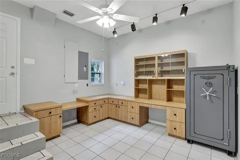 a view of a double vanity sink and a window