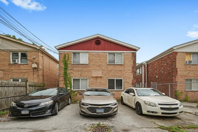 a car parked in front of a house