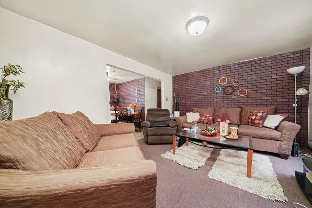 a living room with furniture and a couch