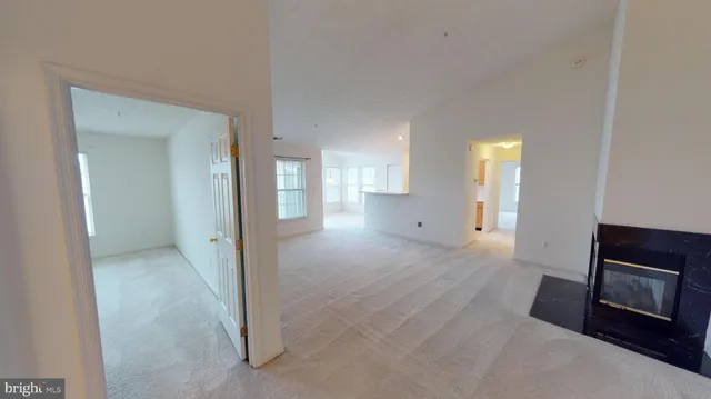 a view of a livingroom with a fireplace
