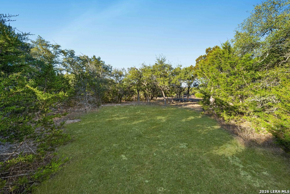 5387 Ranch Road Blanco, TX 78606 - Photo 6 of 7 a view of outdoor space with trees all around