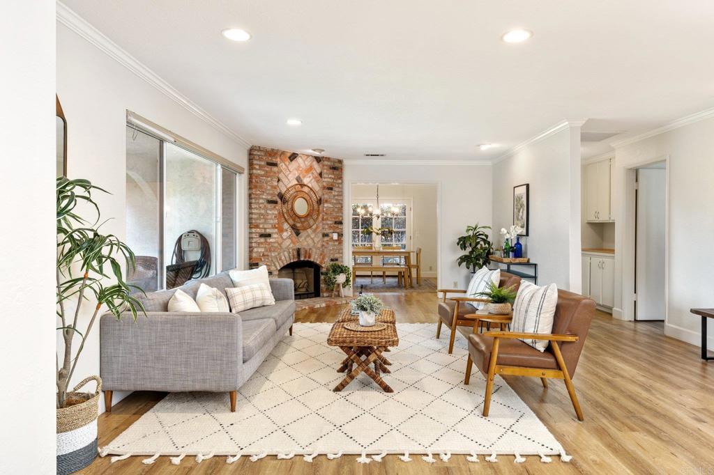 1317 Rincon Road Escondido, CA 92025 - Photo 7 of 42 a living room with furniture and a potted plant