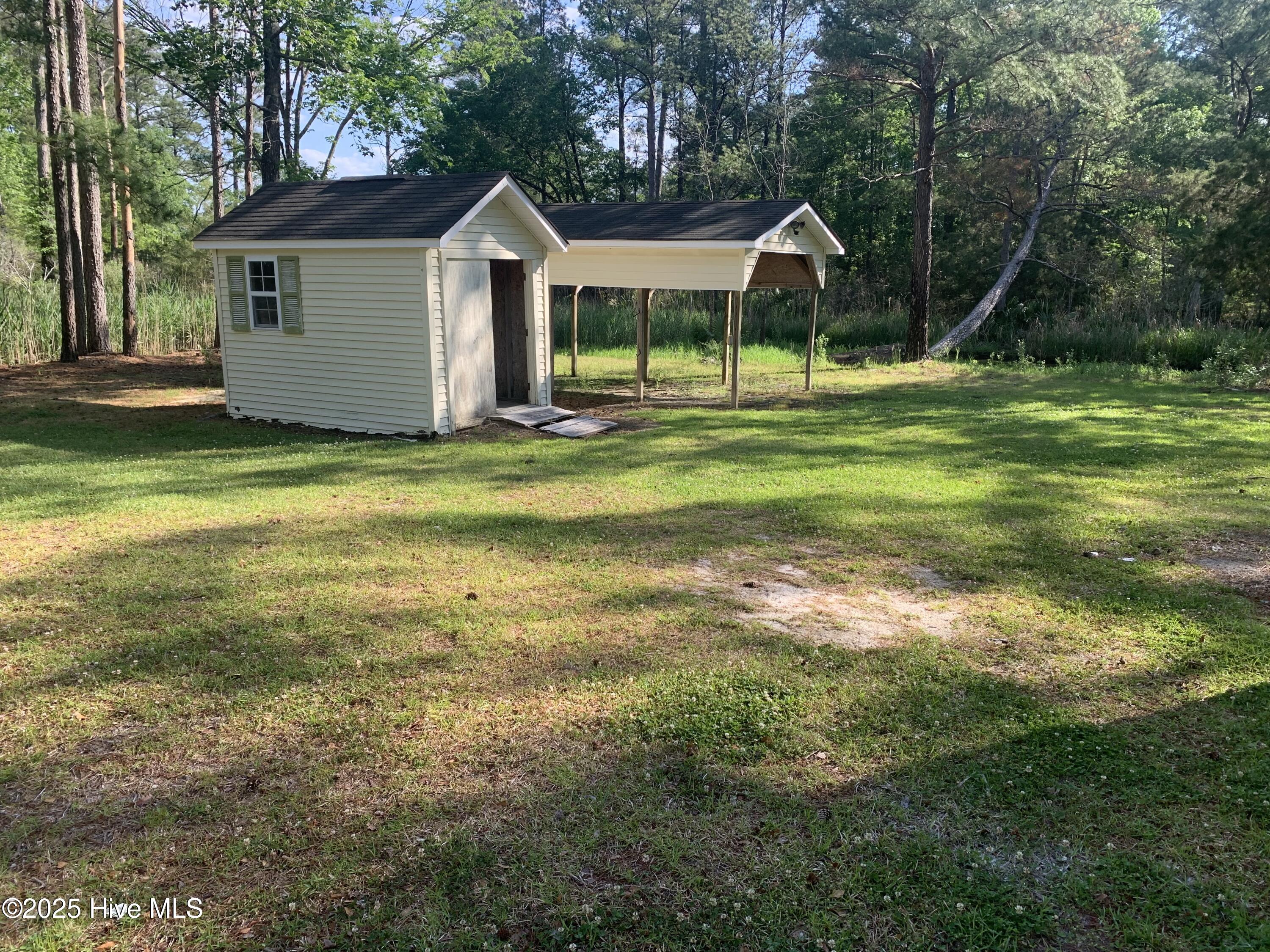 453 Alligator Loop Road Merritt, NC 28556 - Photo 5 of 18 Shed and Covered Boat Storage