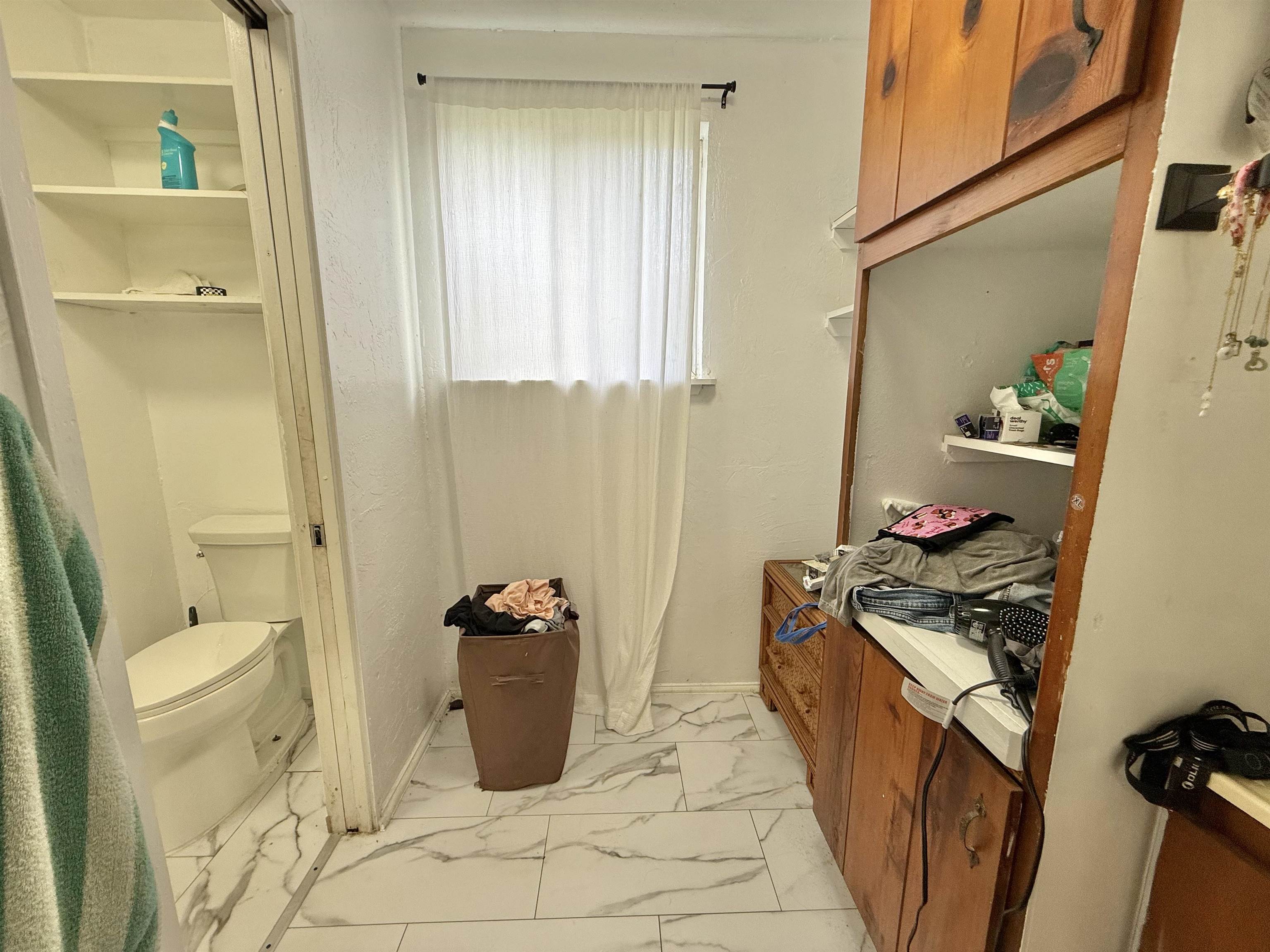 1630 Kauhikoa Road Haiku, HI 96708 - Photo 48 of 48 a bathroom with a sink and toilet