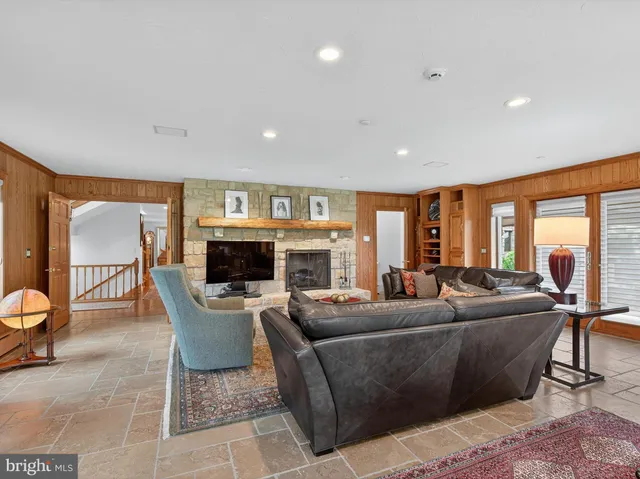 a spacious bedroom with a bed and a table