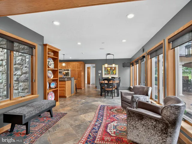 a kitchen with stainless steel appliances granite countertop a stove and a sink