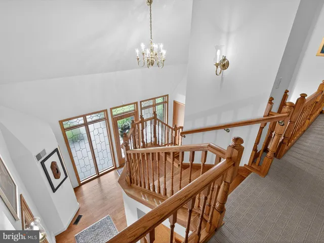 an aerial view of a residential houses with outdoor space