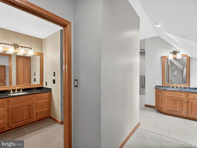 a view of a house with a street