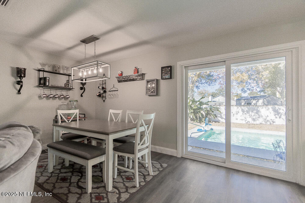 14443 Stacey Road Jacksonville, FL 32250 - Photo 11 of 31 a view of a dining room with furniture window and outside view