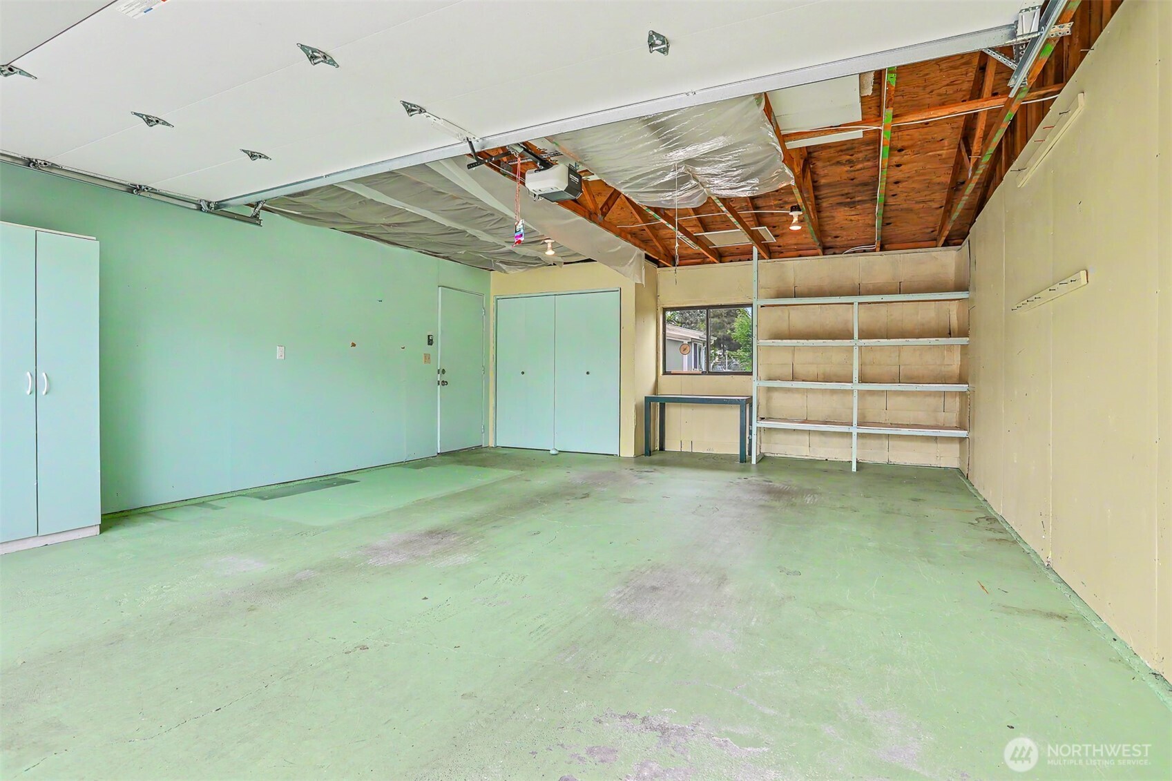 905 243rd Street Southwest Bothell, WA 98021 - Photo 37 of 37 a view of a room with racks on the wall