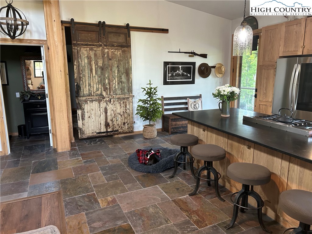 509 Grant Houck Road Todd, NC 28684 - Photo 17 of 50 a lobby with furniture and rug