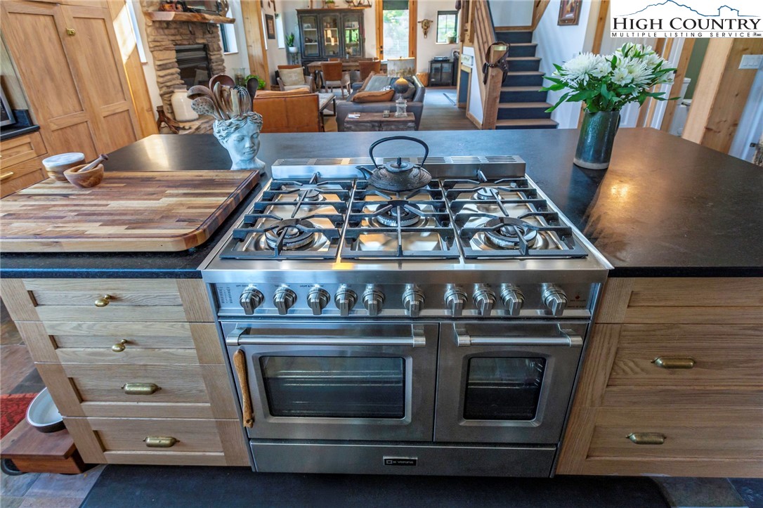 509 Grant Houck Road Todd, NC 28684 - Photo 21 of 50 a stove top oven sitting inside of a kitchen