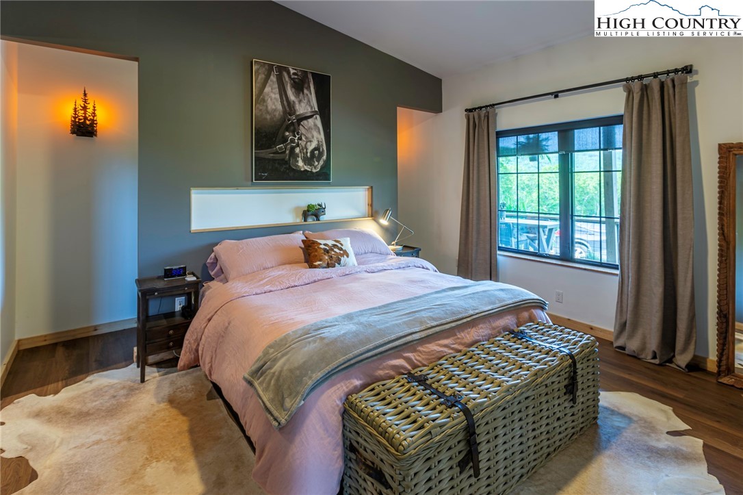 509 Grant Houck Road Todd, NC 28684 - Photo 33 of 50 a bedroom with a bed and a window